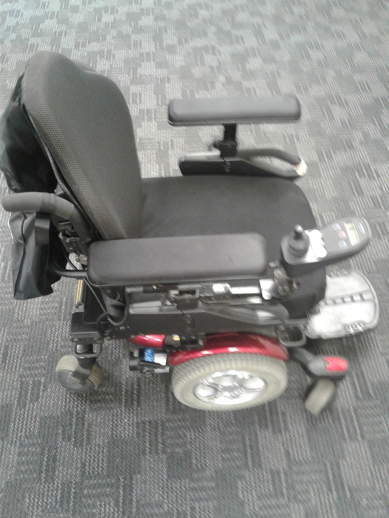 Used Pride Quantum 600 Power Wheelchair, MidWheel Drive, Adjustable